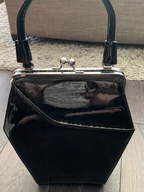 Coffin shaped black vinyl purse